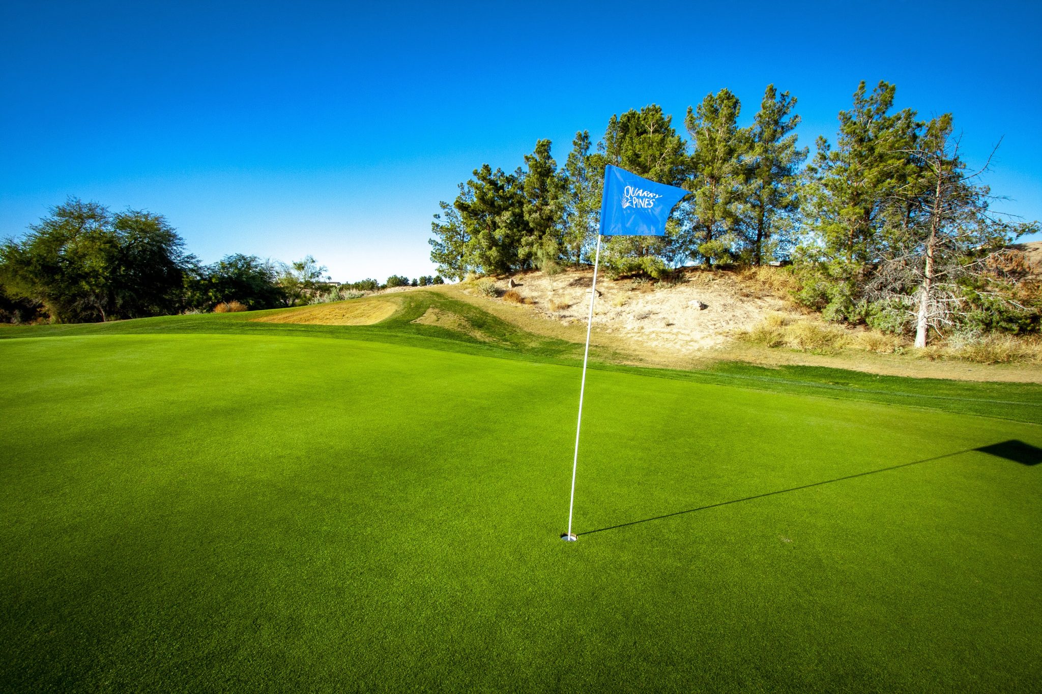 blue flag on golf course